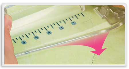 Circle Cutter smooths fabric as it cuts