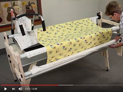 Loading Fabric on a wooden Grace Frame